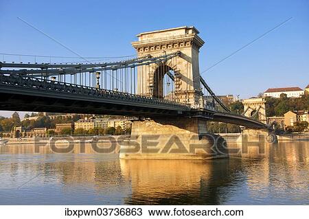 "Szechenyi lanchid, or Szechenyi Chain Bridge, over the Danube between Buda and Pest, Budapest, Hungary, Europe" View Large Photo Image Stock Image - "Szechenyi lanchid, or Szechenyi Chain Bridge, over the Danube between Buda and Pest, Budapest, Hungary, Europe". Fotosearch