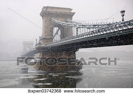 "Szechenyi lanchid, or Szechenyi Chain Bridge, over the Danube between Buda and Pest, Budapest, Hungary, Europe" View Large Photo Image Stock Photo - "Szechenyi lanchid, or Szechenyi Chain Bridge, over the Danube between Buda and Pest, Budapest, Hungary, Europe". Fotosearch