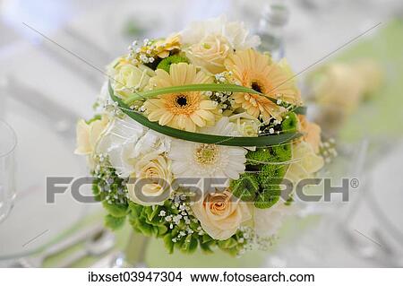 Table decoration of a wedding table with wedding bouquet View Large Photo Image Picture - Table decoration of a wedding table with wedding bouquet. Fotosearch
