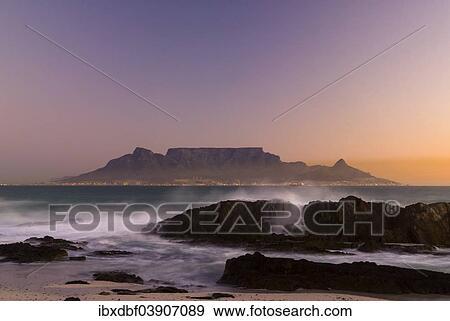 Stock Photo - "Table Mountain, Lion's Head and Devil's Peak in the evening light, panoramic views of Cape Town, Bloubergstrand beach, Table Bay, Atlantic Ocean, Cape Town, Western Cape, South Africa, Africa". Fotosearch