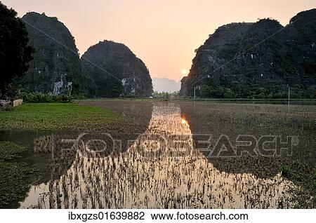 Stock Image - "Tam Coc region near Ninh Binh, dry Halong Bay, Vietnam, Southeast Asia, Asia". Fotosearch