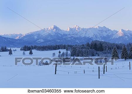 "Tannheim Mountains at sunrise in winter, near Halblech, Swabia, Bavaria, Germany, Europe" View Large Photo Image Stock Photography - "Tannheim Mountains at sunrise in winter, near Halblech, Swabia, Bavaria, Germany, Europe". Fotosearch