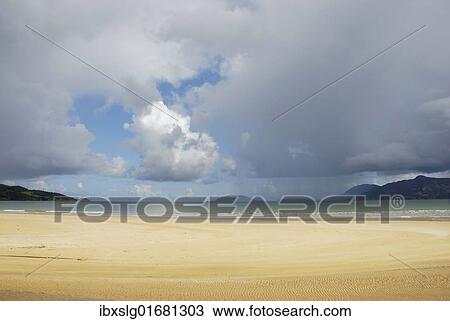 "Tannic river flowing into a churning sea under storm clouds, beach at Porta Salon, County Donegal, Republic of Ireland, Europe" View Large Photo Image Stock Image - "Tannic river flowing into a churning sea under storm clouds, beach at Porta Salon, County Donegal, Republic of Ireland, Europe". Fotosearch