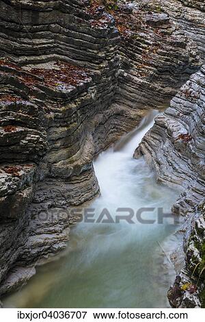 "Taugl stream, autumn, washouts, rock layers, Tauglschlucht gorge, District Hallein, Salzburg, Austria, Europe" View Large Photo Image Stock Photo - "Taugl stream, autumn, washouts, rock layers, Tauglschlucht gorge, District Hallein, Salzburg, Austria, Europe". Fotosearch