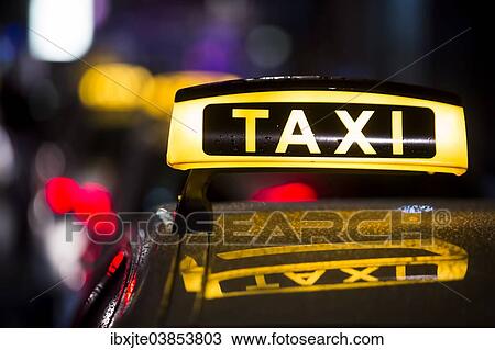 "Taxi in the rain at night, Cologne, North Rhine-Westphalia, Germany, Europe" View Large Photo Image Stock Image - "Taxi in the rain at night, Cologne, North Rhine-Westphalia, Germany, Europe". Fotosearch