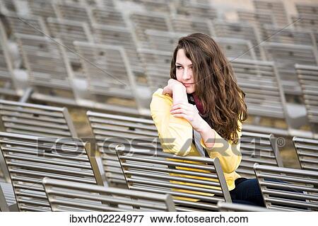 Stock Photo - "Teenage girl, 15 years, in an open-air theatre, Bad Staffelstein, Bavaria, Germany, Europe". Fotosearch