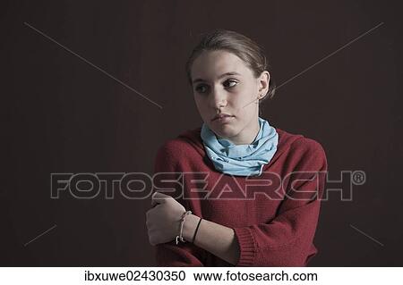 Teenage girl with a thoughtful expression View Large Photo Image Stock Image - Teenage girl with a thoughtful expression. Fotosearch