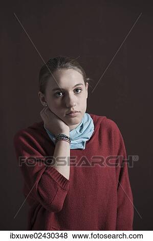 Teenage girl with a thoughtful expression View Large Photo Image Stock Photo - Teenage girl with a thoughtful expression. Fotosearch