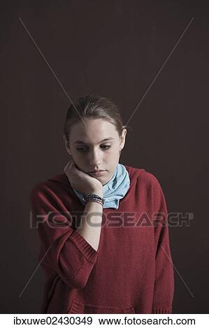 Teenage girl with a thoughtful expression View Large Photo Image Stock Photo - Teenage girl with a thoughtful expression. Fotosearch