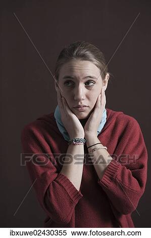 Teenage girl with a thoughtful expression View Large Photo Image Stock Photography - Teenage girl with a thoughtful expression. Fotosearch