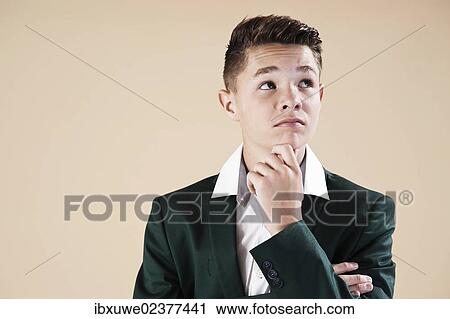 "Teenager in a formal jacket, thoughtful" View Large Photo Image Stock Image - "Teenager in a formal jacket, thoughtful". Fotosearch