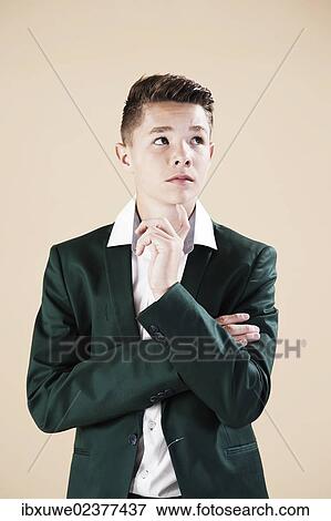 "Teenager in a formal jacket, thoughtful" View Large Photo Image Stock Photo - "Teenager in a formal jacket, thoughtful". Fotosearch