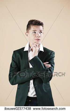 "Teenager in a formal jacket, thoughtful" View Large Photo Image Stock Photo - "Teenager in a formal jacket, thoughtful". Fotosearch