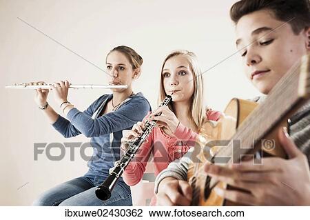 Teenagers making music together View Large Photo Image Stock Image - Teenagers making music together. Fotosearch