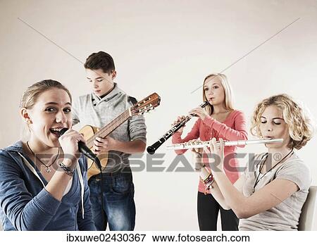 Teenagers making music together View Large Photo Image Stock Photo - Teenagers making music together. Fotosearch