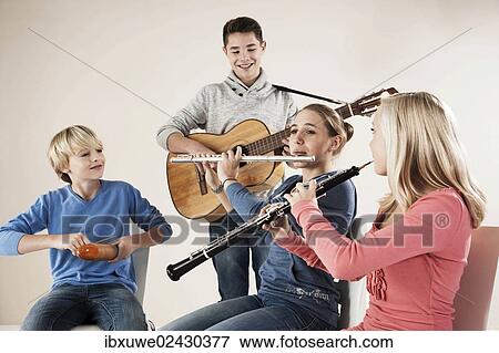Teenagers making music together View Large Photo Image Stock Photo - Teenagers making music together. Fotosearch