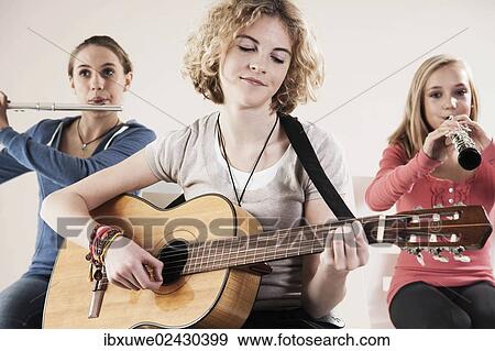 Teenagers making music together View Large Photo Image Stock Photo - Teenagers making music together. Fotosearch