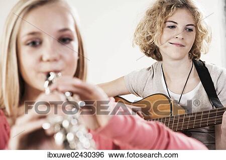 Teenagers making music together View Large Photo Image Stock Photograph - Teenagers making music together. Fotosearch