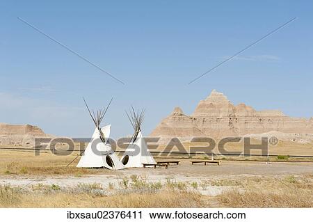 "Teepees, tents of the Oglala Lakota or Oglala Sioux subtribes, eroded landscape and grass prairie, Badlands National Park, South Dakota, USA, United States of America, North America" View Large Photo Image Stock Image - "Teepees, tents of the Oglala Lakota or Oglala Sioux subtribes, eroded landscape and grass prairie, Badlands National Park, South Dakota, USA, United States of America, North America". Fotosearch