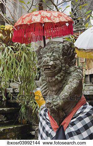 "Temple guardian, decorated stone figure, Pura Desa Temple, Ubud, Bali, Indonesia, Asia" View Large Photo Image Picture - "Temple guardian, decorated stone figure, Pura Desa Temple, Ubud, Bali, Indonesia, Asia". Fotosearch