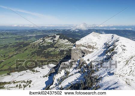 Stock Image - "The 1751m high, snow-capped Kamor mountain in the Appenzell Alps, canton of Appenzell Innerrhoden, Switzerland, Europe". Fotosearch