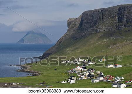 "The Hvalba settlement, Hvalbiarfjorour, the uninhabited island of Litla Dimun at the back, Suouroy, Faroe Islands, Denmark, Europe" View Large Photo Image Stock Photo - "The Hvalba settlement, Hvalbiarfjorour, the uninhabited island of Litla Dimun at the back, Suouroy, Faroe Islands, Denmark, Europe". Fotosearch