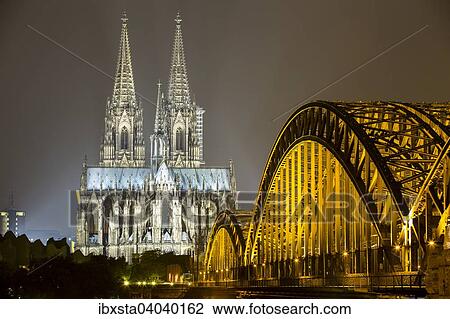 "The illuminated Cologne Cathedral and Hohenzollern Bridge at night, Deutz, Cologne, North Rhine-Westphalia, Germany, Europe" View Large Photo Image Stock Image - "The illuminated Cologne Cathedral and Hohenzollern Bridge at night, Deutz, Cologne, North Rhine-Westphalia, Germany, Europe". Fotosearch