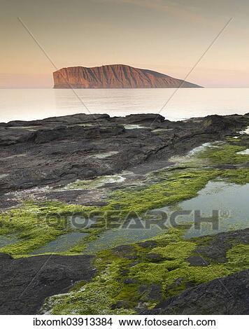 Picture - "The island Fugloy in the light of the midnight sun, Viooy, Faroe Islands, Denmark, Europe". Fotosearch