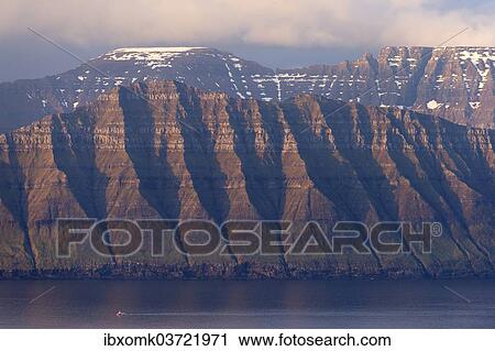 "The islands of Kalsoy and Kunoy in the light of the midnight sun, Kalsoy, Norooyar, Faroe Islands, Denmark, Europe" View Large Photo Image Stock Image - "The islands of Kalsoy and Kunoy in the light of the midnight sun, Kalsoy, Norooyar, Faroe Islands, Denmark, Europe". Fotosearch