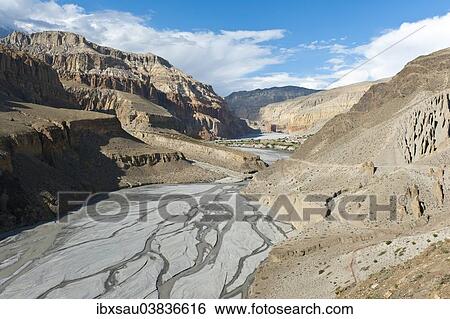 "The Kali Gandaki valley, torrential stream in its gorge, erosion landscape, near Chhusang, Upper Mustang, Lo, Himalayas, Nepal, Asia" View Large Photo Image Stock Photograph - "The Kali Gandaki valley, torrential stream in its gorge, erosion landscape, near Chhusang, Upper Mustang, Lo, Himalayas, Nepal, Asia". Fotosearch