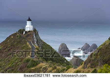 Stock Image - "The Lighthouse at Nugget Point, Nugget Point, Ahuriri Flat, Otago Region, New Zealand, Oceania". Fotosearch
