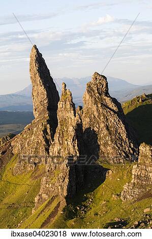 "The Old Man of Storr and surrounding rock pinnacles at dawn, Cuilin Ridge behind, Isle of Skye, Scotland, United Kingdom, Europe" View Large Photo Image Stock Photo - "The Old Man of Storr and surrounding rock pinnacles at dawn, Cuilin Ridge behind, Isle of Skye, Scotland, United Kingdom, Europe". Fotosearch