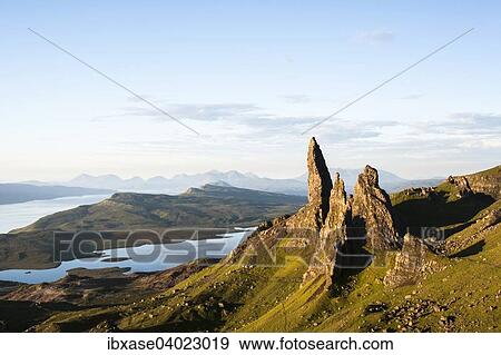 "The Old Man of Storr and surrounding rock pinnacles in early morning, Cuilin Ridge behind, Isle of Skye, Scotland, United Kingdom, Europe" View Large Photo Image Stock Photo - "The Old Man of Storr and surrounding rock pinnacles in early morning, Cuilin Ridge behind, Isle of Skye, Scotland, United Kingdom, Europe". Fotosearch