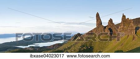 "The Old Man of Storr at dawn with Loch Leathan behind, and the Cuillin Ridge in distance, Isle of Skye, Scotland, United Kingdom, Europe" View Large Photo Image Stock Photo - "The Old Man of Storr at dawn with Loch Leathan behind, and the Cuillin Ridge in distance, Isle of Skye, Scotland, United Kingdom, Europe". Fotosearch