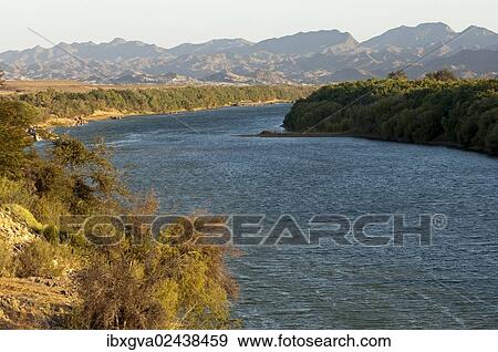 "The Orange River, also Oranje or Gariep River at Sendelingsdrif, border river between South Africa, left, and Namibia, right, Sendelingsdrif, Richtersveld, South Africa, Africa" View Large Photo Image Stock Photo - "The Orange River, also Oranje or Gariep River at Sendelingsdrif, border river between South Africa, left, and Namibia, right, Sendelingsdrif, Richtersveld, South Africa, Africa". Fotosearch
