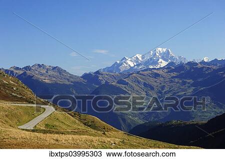 "The pass road leading up to Col de la Madeleine, the snow-capped peaks of the Mont Blanc Massif at the back, Alps, France, Europe" View Large Photo Image Stock Image - "The pass road leading up to Col de la Madeleine, the snow-capped peaks of the Mont Blanc Massif at the back, Alps, France, Europe". Fotosearch