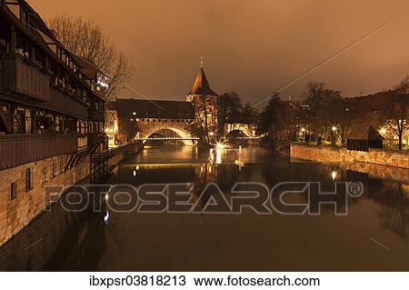 "The Pegnitz river with the Henkersteg bridge and the Henkerhaus, executioner's house, at night, Nuremberg, Middle Franconia, Bavaria, Germany, Europe" View Large Photo Image Stock Image - "The Pegnitz river with the Henkersteg bridge and the Henkerhaus, executioner's house, at night, Nuremberg, Middle Franconia, Bavaria, Germany, Europe". Fotosearch