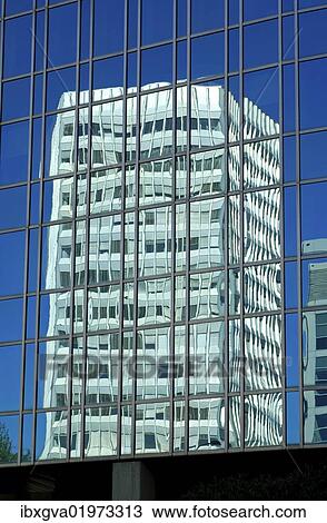 "The skyscraper of the International Telecommunication Union IT reflected in the glass facade of an adjacent building, Geneva, Switzerland, Europe" View Large Photo Image Stock Image - "The skyscraper of the International Telecommunication Union IT reflected in the glass facade of an adjacent building, Geneva, Switzerland, Europe". Fotosearch