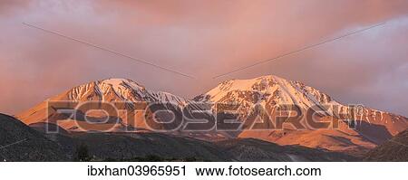 "The Taapaca volcano at sunset, Putre, Arica and Parinacota Region, Chile, South America" View Large Photo Image Stock Image - "The Taapaca volcano at sunset, Putre, Arica and Parinacota Region, Chile, South America". Fotosearch