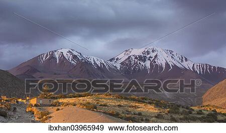 "The Taapaca volcano in the last evening light, Putre, Arica and Parinacota Region, Chile, South America" View Large Photo Image Stock Photo - "The Taapaca volcano in the last evening light, Putre, Arica and Parinacota Region, Chile, South America". Fotosearch