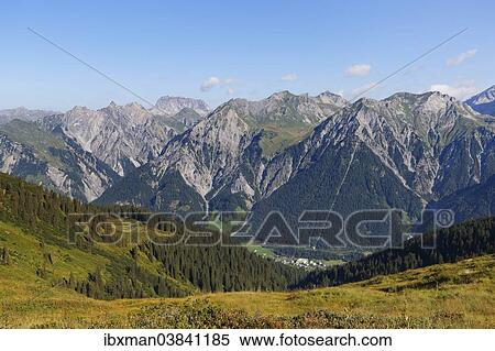 Stock Photography - "The town of Wald am Arlberg in the Klostertal valley, Lechquellen Mountains with Rote Wand mountain and Gamsbodenspitze mountain, Vorarlberg, Austria, Europe". Fotosearch
