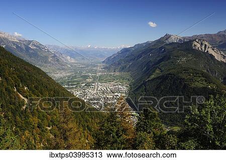 "The view of the Rhone valley from Martigny to Sierre and Leukerbad, Canton of Valais, Switzerland, Europe" View Large Photo Image Stock Image - "The view of the Rhone valley from Martigny to Sierre and Leukerbad, Canton of Valais, Switzerland, Europe". Fotosearch