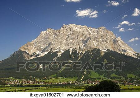 "The village Ehrwald at the foot of the Wettersteingebirge mountains with Mt. Zugspitze, Tiroler Zugspitze, Austria, Europe" View Large Photo Image Stock Image - "The village Ehrwald at the foot of the Wettersteingebirge mountains with Mt. Zugspitze, Tiroler Zugspitze, Austria, Europe". Fotosearch