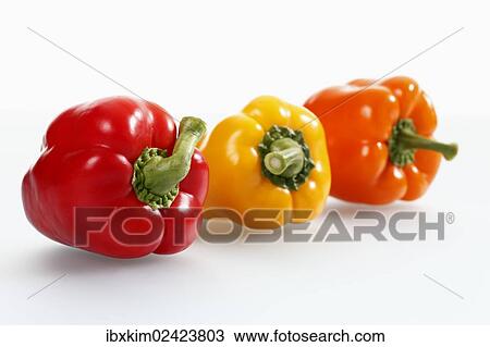 "Three bell peppers, red, yellow and orange" View Large Photo Image Stock Image - "Three bell peppers, red, yellow and orange". Fotosearch