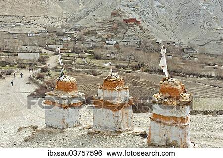 Stock Photograph - "Three chorten, Tibetan religious buildings, near the village of Geling, Upper Mustang, Lo, Nepal, Asia". Fotosearch