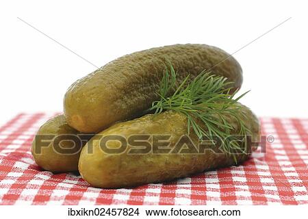 Three gherkins with dill View Large Photo Image Picture - Three gherkins with dill. Fotosearch