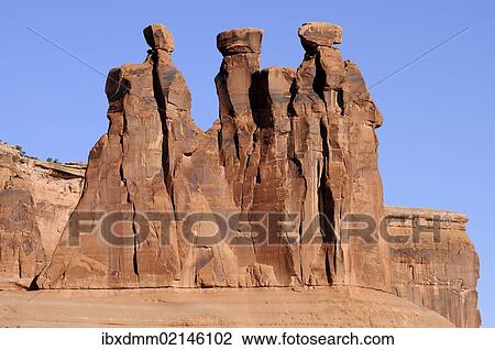 "Three Gossips rock formation, Arches National Park, Utah, USA" View Large Photo Image Stock Image - "Three Gossips rock formation, Arches National Park, Utah, USA". Fotosearch