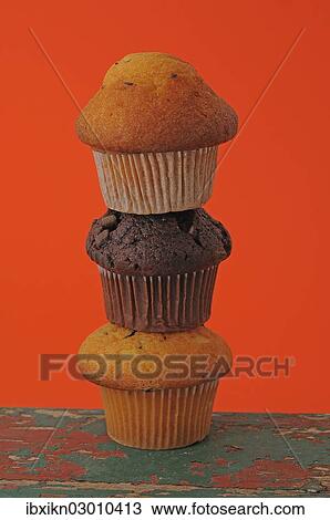 "Three muffins, stacked" View Large Photo Image Stock Image - "Three muffins, stacked". Fotosearch