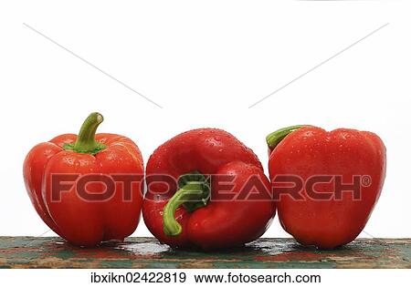 Three red capsicums View Large Photo Image Stock Photo - Three red capsicums. Fotosearch