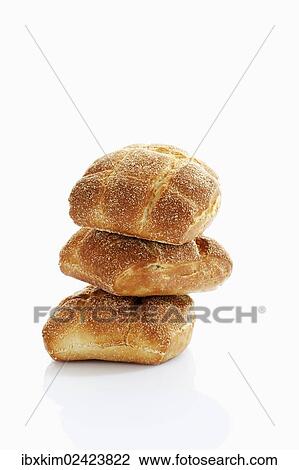 Three stacked wheat rolls View Large Photo Image Stock Image - Three stacked wheat rolls. Fotosearch
